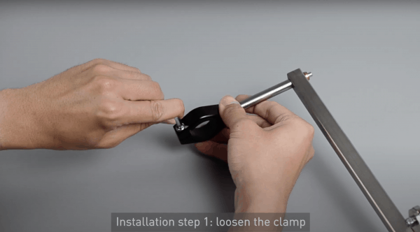 Loosen the clamp of the mounting bracket