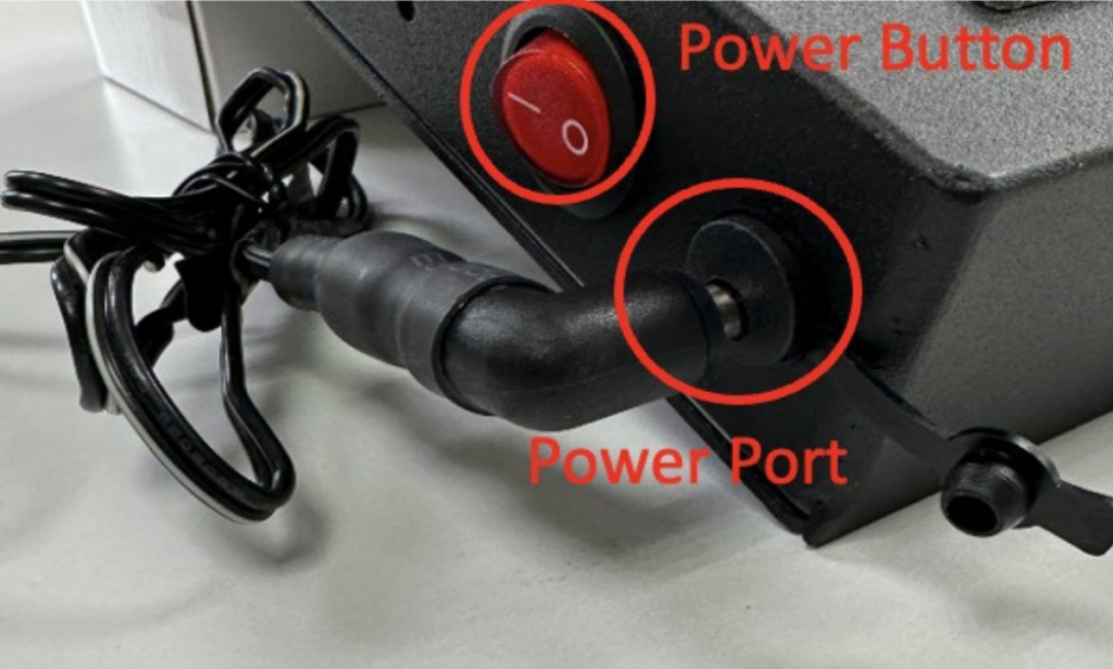 Power on the Monitor Console by pressing the power button and wait for the boot-up process to complete.