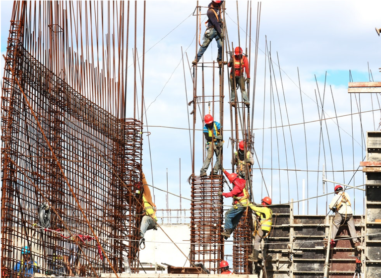 Construction workers operating at height
