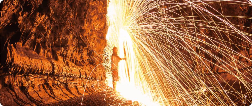 Worker working in underground tunnel
