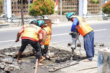 Workers are working on an under-construction road